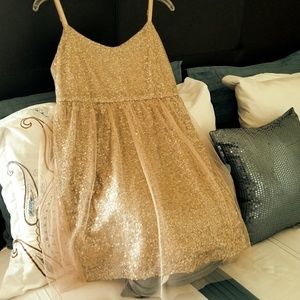Prom embellished peach netting dress.